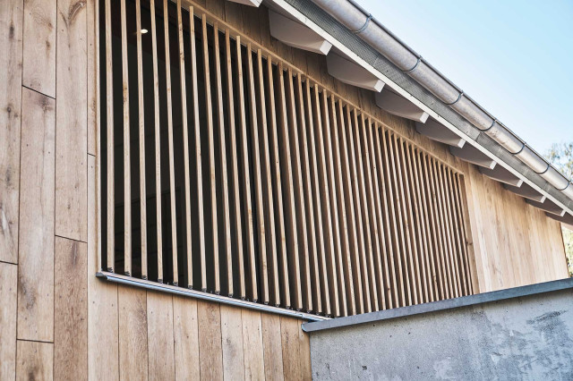 Boutique Apartment Bergfreuden - Moderne Holzfassade mit Panoramaverglasung und Holzlamellen (Photo 19)